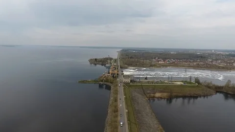 Flying over the dam on which the car ride. Volga. Russia. Stock Footage 96153265
