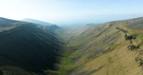 Flying over a deep valley in north England Video stock 331541955