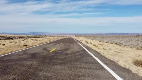 Flying over a desert highway into a panoramic shot in Utah Video stock 153249397