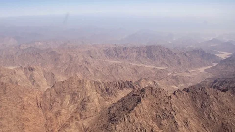 Flying over the desert mountains Stock Footage 73975319