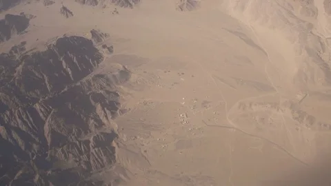 Flying over the desert mountains Stock Footage 75755135