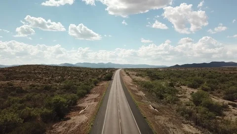 Flying over deserted West Texas highway Stock Footage 101077832