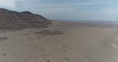 Flying over a desolate moor. Desert. Video stock 170533789