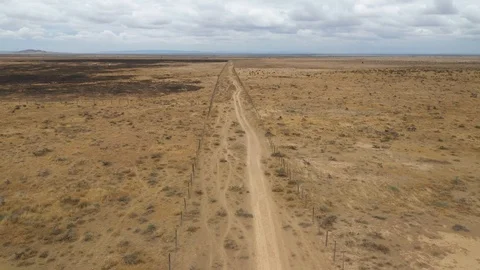 Flying over dessert in Kenya drone stock footage by DroneRune 3 Stock Footage 126998034