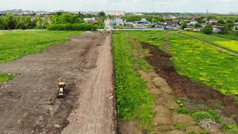 Flying over the dirt road. Construction of the road from the air. Stock Footage 111527347