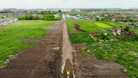 Flying over the dirt road. Construction of the road from the air. Stock Footage 111527491