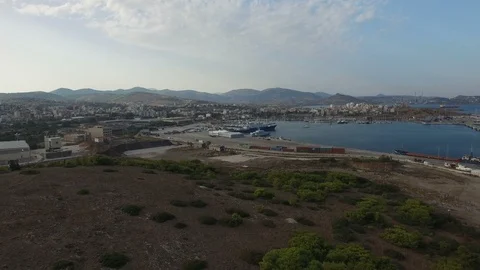 Flying over docks, containers, loaders, trucks and cargo ships Stock Footage 86959295