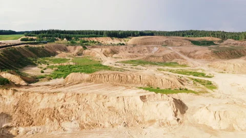Flying over a drone over an open pit. Drone view of the sand pit. Stock Footage 156596301