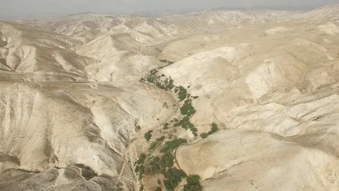 Flying over the dry river of Wadi Qelt. West Bank. Israel. DJI-0177-04 Video stock 124455608