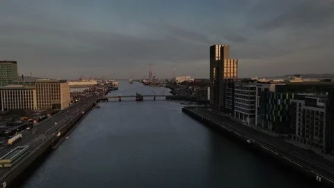 Flying over Dublin docklands by the drone during sunset Stock Footage 151055447