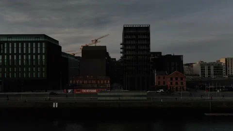 Flying over Dublin docklands by the drone during sunset Stock Footage 151055502