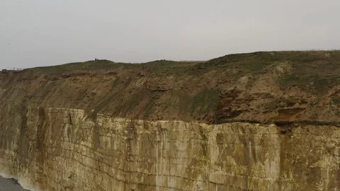 Flying over the edge of the cliff Stock Footage