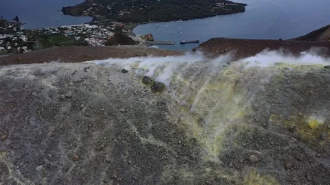 Flying over the edge of a volcano reveals a beautiful landscape Stock Footage 121295729