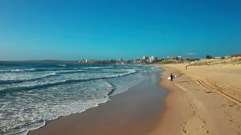 Flying over an empty beach on the northern coast of Sydney Stock Footage 102496862