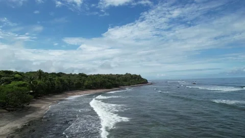Flying over empty beach with pan Stock Footage 211203505