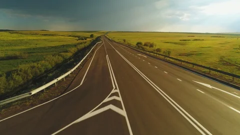 Flying over the empty road. Aerial view 4 k Stock-Footage 94975451