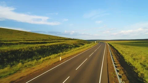 Flying over the empty road. Aerial view 4 k Stock-Footage 94975625