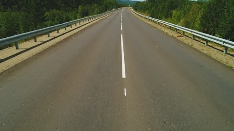 Flying over the empty road. Aerial view 4 k Stock-Footage 95687603