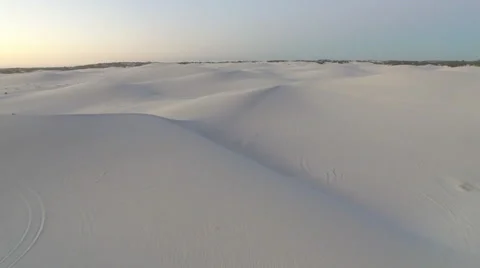 Flying Over Endless Sand Dunes in Desert in Atlantis Stock Footage 64999702