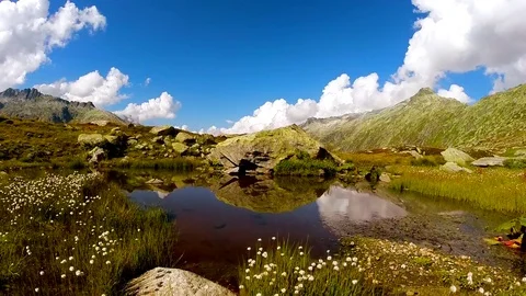 Flying over epic mountain landscape scenery peaceful nature background Stock Footage 74089081