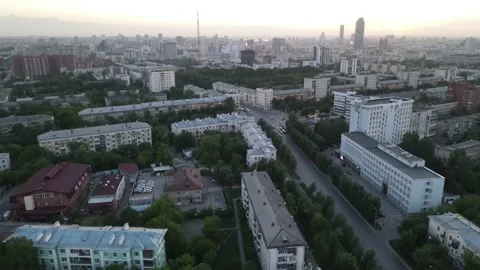Flying over the evening city Stock Footage 154481044
