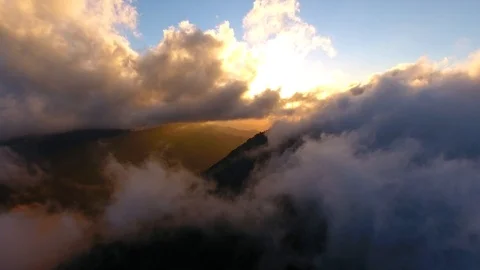 Flying over the evening clouds with the evening sun. Stock Footage 93354887