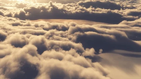 Flying over the evening clouds with the late sun. Seamless with alpha mask. Stock Footage 107053688