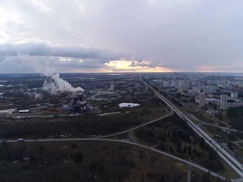 Flying over the factory, freeway at sunset. Stock Footage 73119649