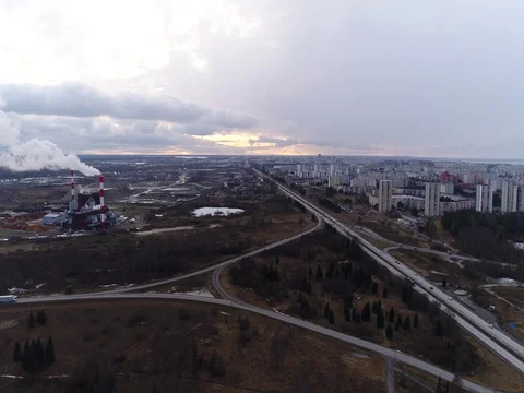 Flying over the factory, freeway at sunset. Stock Footage 73120052