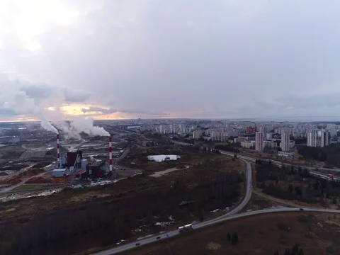 Flying over the factory, freeway at sunset. Stock Footage 73151773