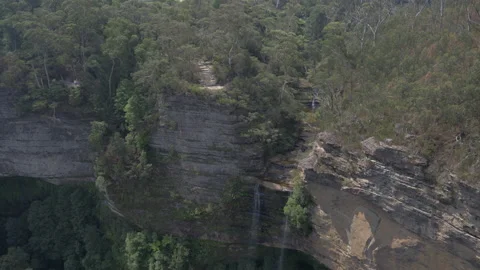 Flying over a Falls in Blue Mountains Forest in Katoomba area, Australia 4K 스톡 동영상 131237328