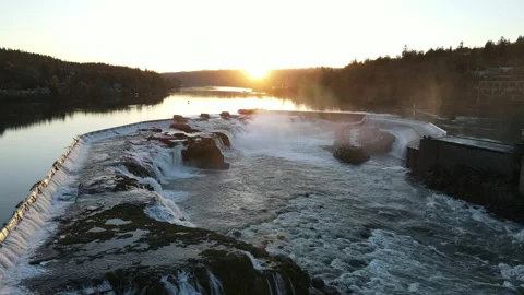 Flying over falls with sun setting behind Stock-Footage 168858090