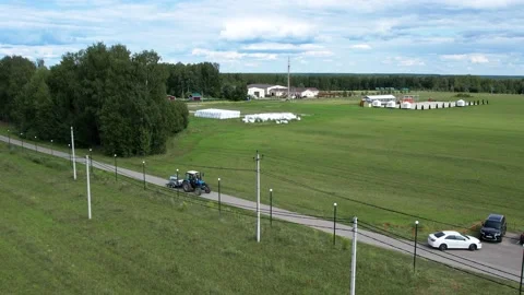 Flying over a farm producing cheese.Cheese farm.Green fields.Nature.Aerial photo Stock Footage 158815249