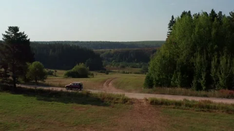 Flying over the field during the day Stock Footage 214362813