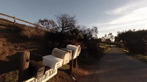 Flying over the fields and farms. Mailboxes. Stock Footage 49900932