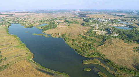 Flying Over Fields and River Stock-Footage 68346076