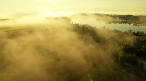 Flying over fields and rivers in the fog. Altai. Siberia Stock Footage 33655257
