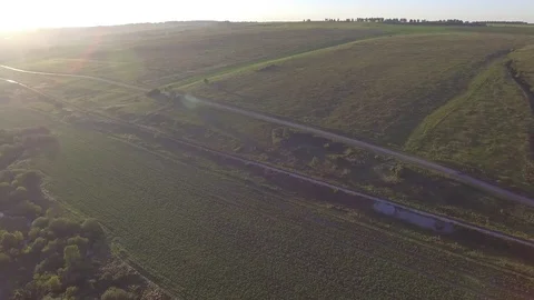 Flying over fields and roads aerial view Video stock 71844285