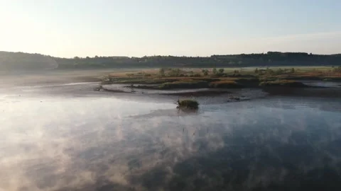 Flying Over A Floating Lake House in the Misty Foggy Morning. Drone Footage. Stock Footage 161032914