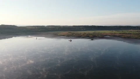 Flying Over A Floating Lake House in the Misty Foggy Morning. Drone Footage. Stock Footage 161033232