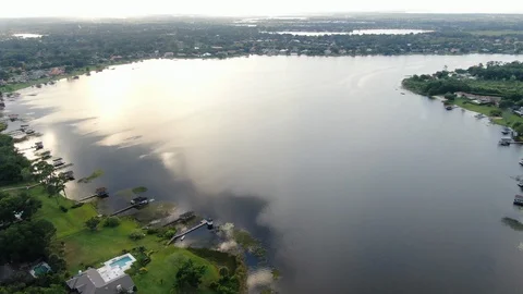 Flying Over Florida Lake Side Homes Near Dusk Vídeo Stock 106755360