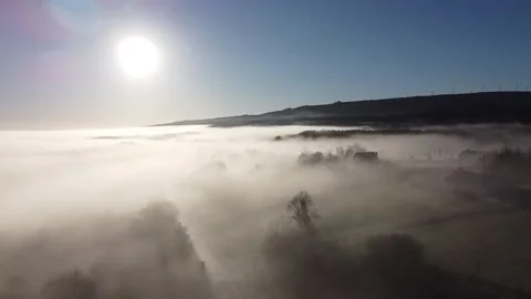 Flying over fog Stock Footage 146297232