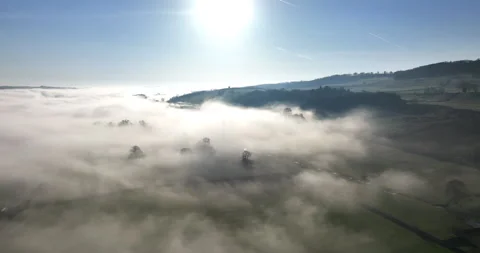 Flying over the foggy fields Video stock 237668853