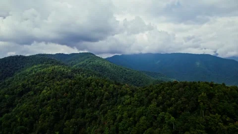 Flying over a forest and mountains in Georgia at a daytime. cloudy Stock Footage 252737178