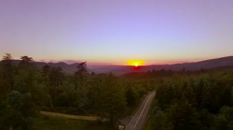 Flying Over a Forest at Sunset Stock Footage 66922545