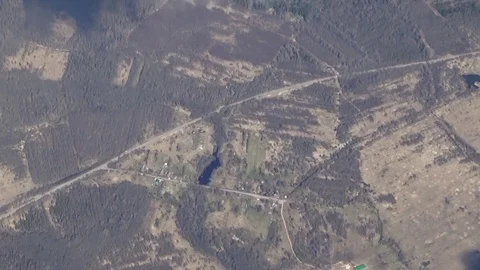 Flying over the forests and clouds Stock Footage 75579741