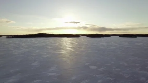 Flying over frozen lake Stock Footage 75763578