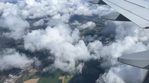 Flying over Germany - over the clouds and fields Stock Footage 274120565