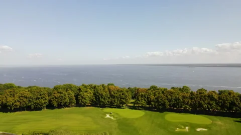 Flying over the golf course. Opening of the view of the Kiev Sea. The beauty of 스톡 동영상 198908694