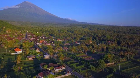 Flying over green fields and landscape with volcano Video stock 94150822